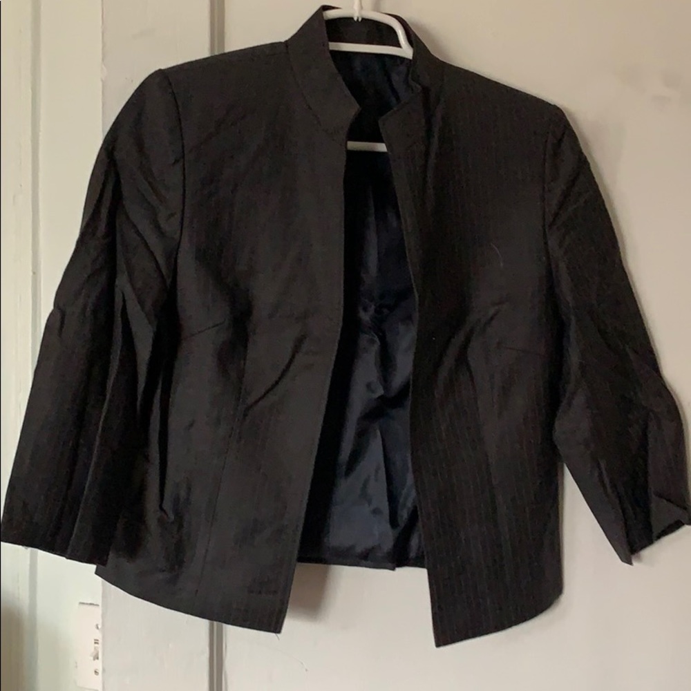 Short pin stripe jacket.